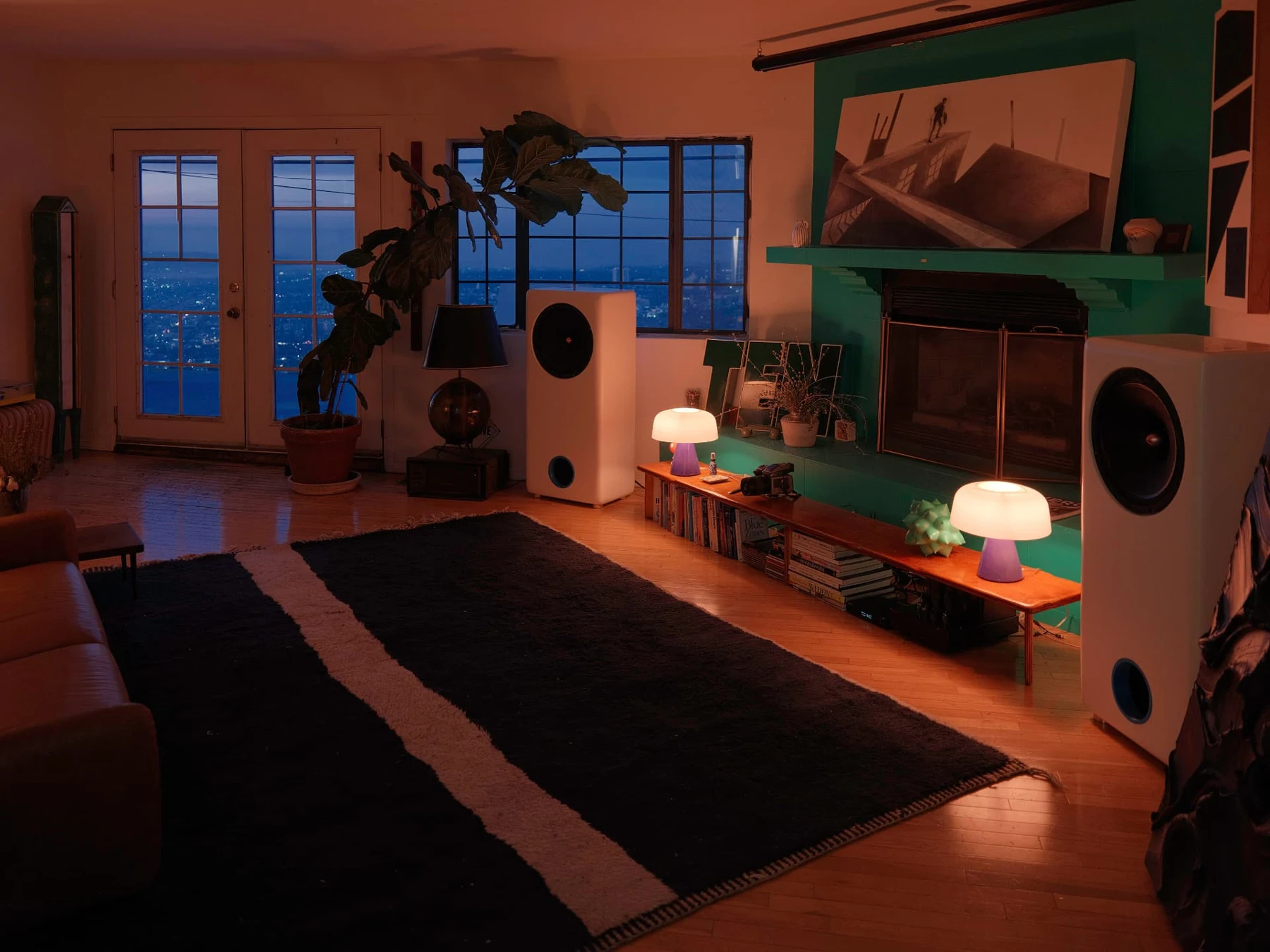 Cobalt speakers in a warmly lit listening room at dusk