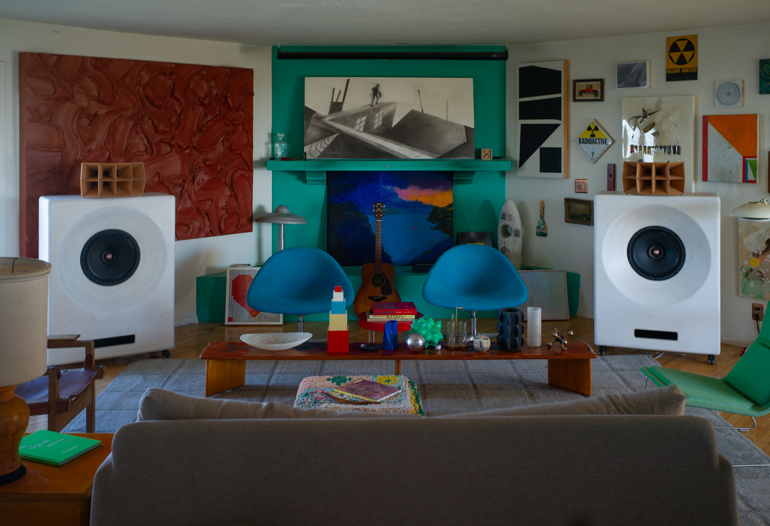White Cobalt loudspeakers with wooden horns among art and furniture in a Los Angeles listening space