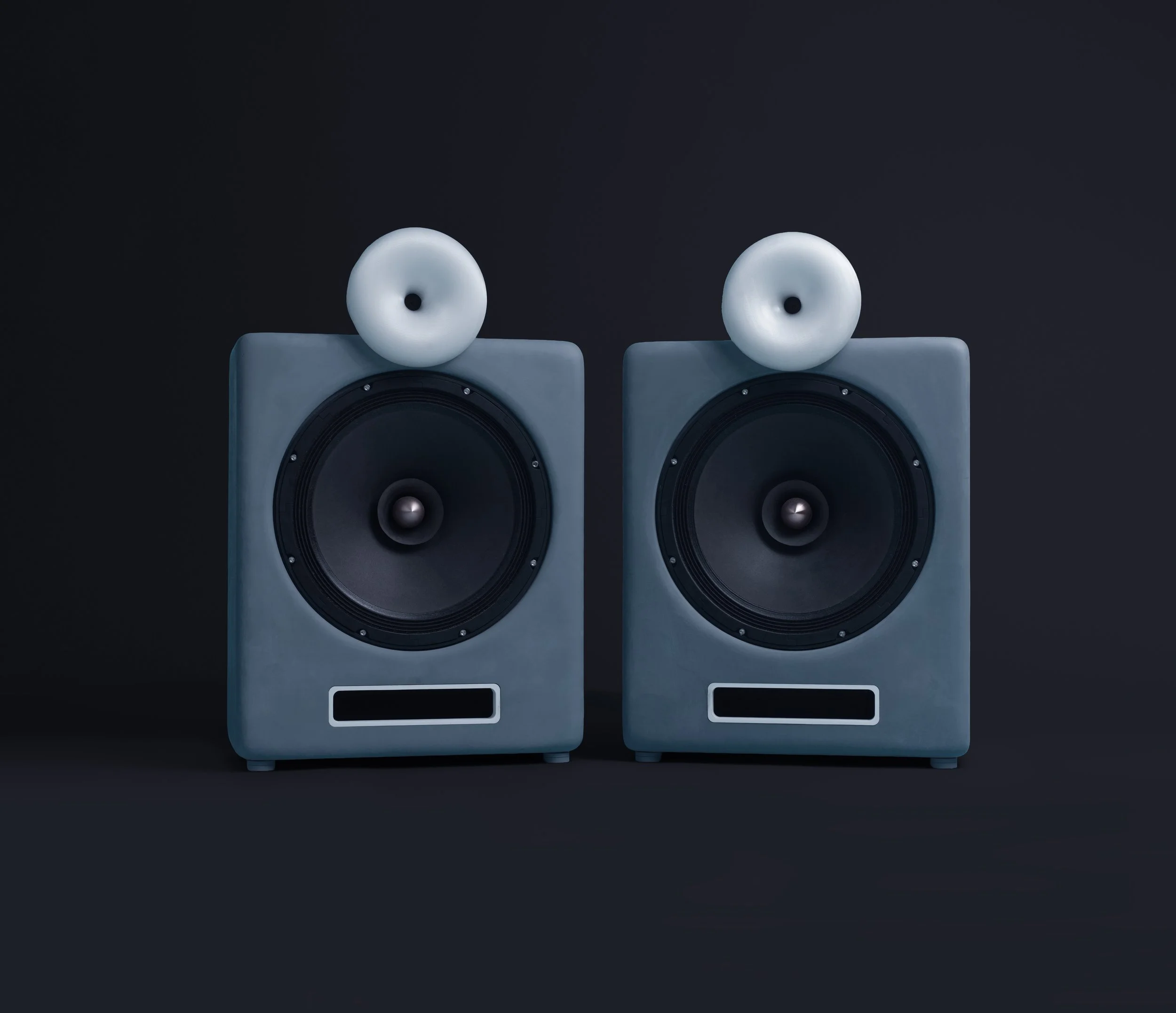 Blue Cobalt loudspeaker cabinets with white horn tweeters